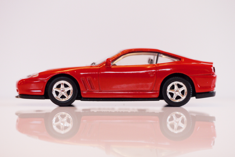 Illustration for article titled Kyosho Ferrari 2 1/64 #48 - Project Prancing Horse #48 - 2002 Ferrari 575 Maranello